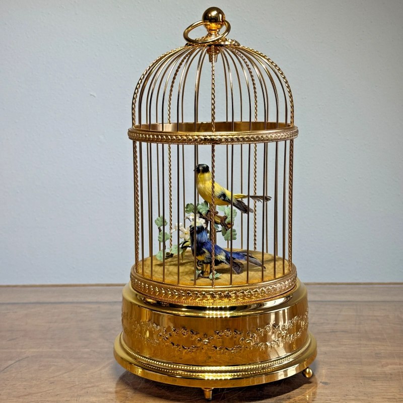Goldenfinch and blue tit in a Reuge dome cage — 9